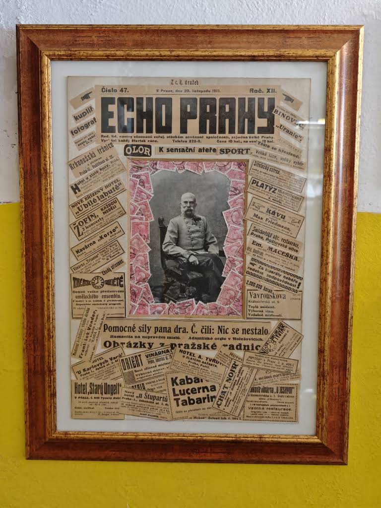 Zarámované historické noviny Echo Prahy z roku 1913